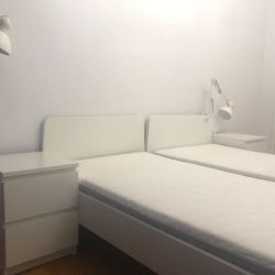 Two sets of a single bed with mattress and chest of drawers